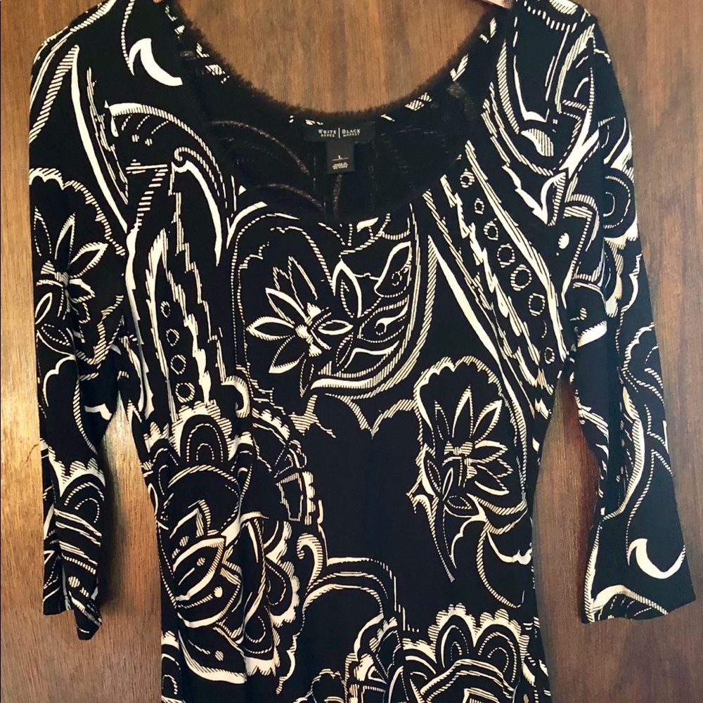 Very comfy and flattering 3/4 inch sleeve dress
